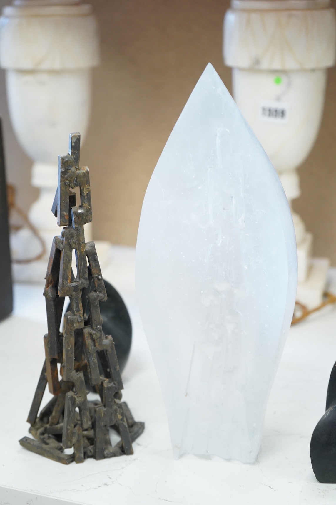 A contemporary Brutalist style glass and iron sculpture and two bronzes signed 'VA', 27cm